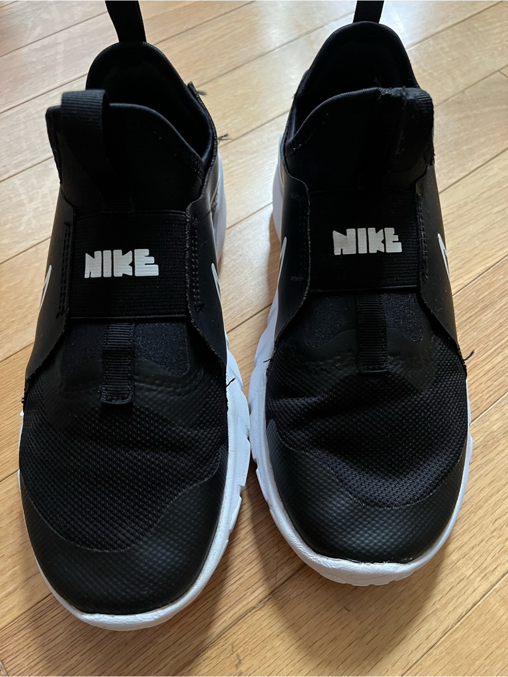 Nike Kids Black and White Slip-On Sneakers